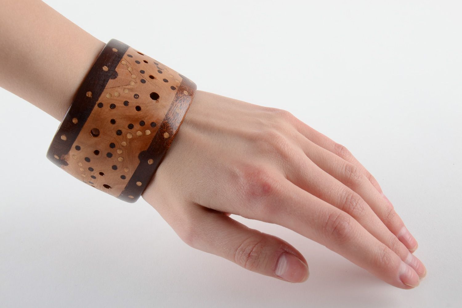Handmade two-colored wide wooden wrist bracelet with inlay and perforation  photo 5