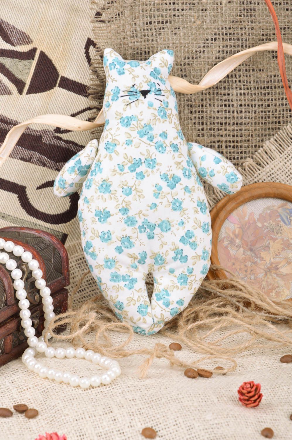 Soft fabric cat made of cotton with flower pattern handmade blue decorative toy photo 1