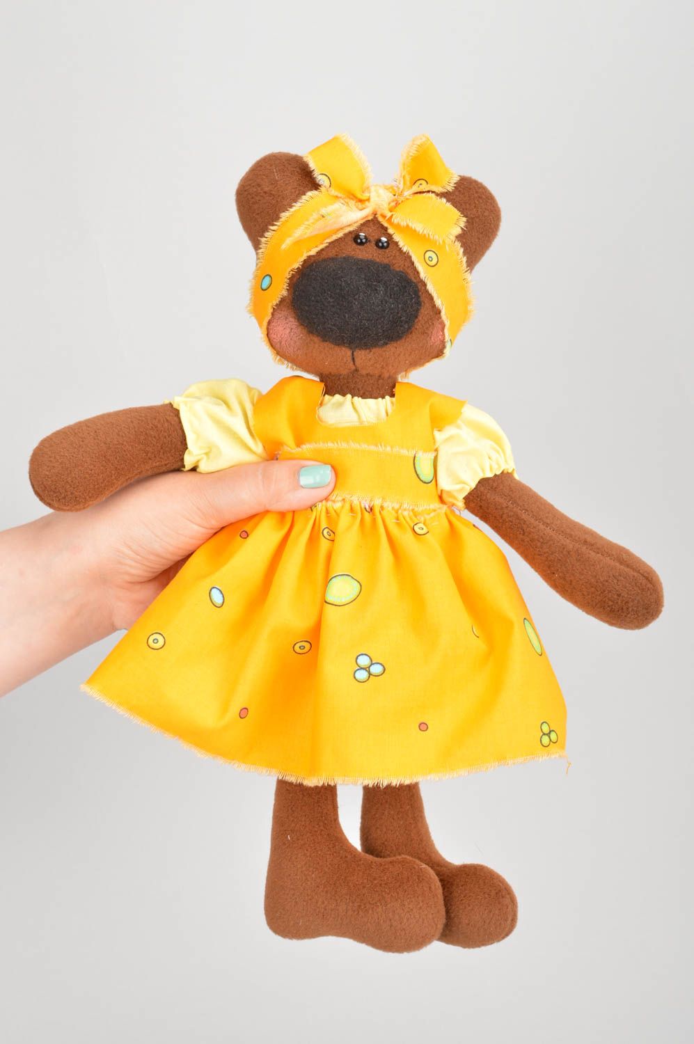 Детская игрушка мягкая из флиса мишка девочка в желтом платье с бантиком фото 3