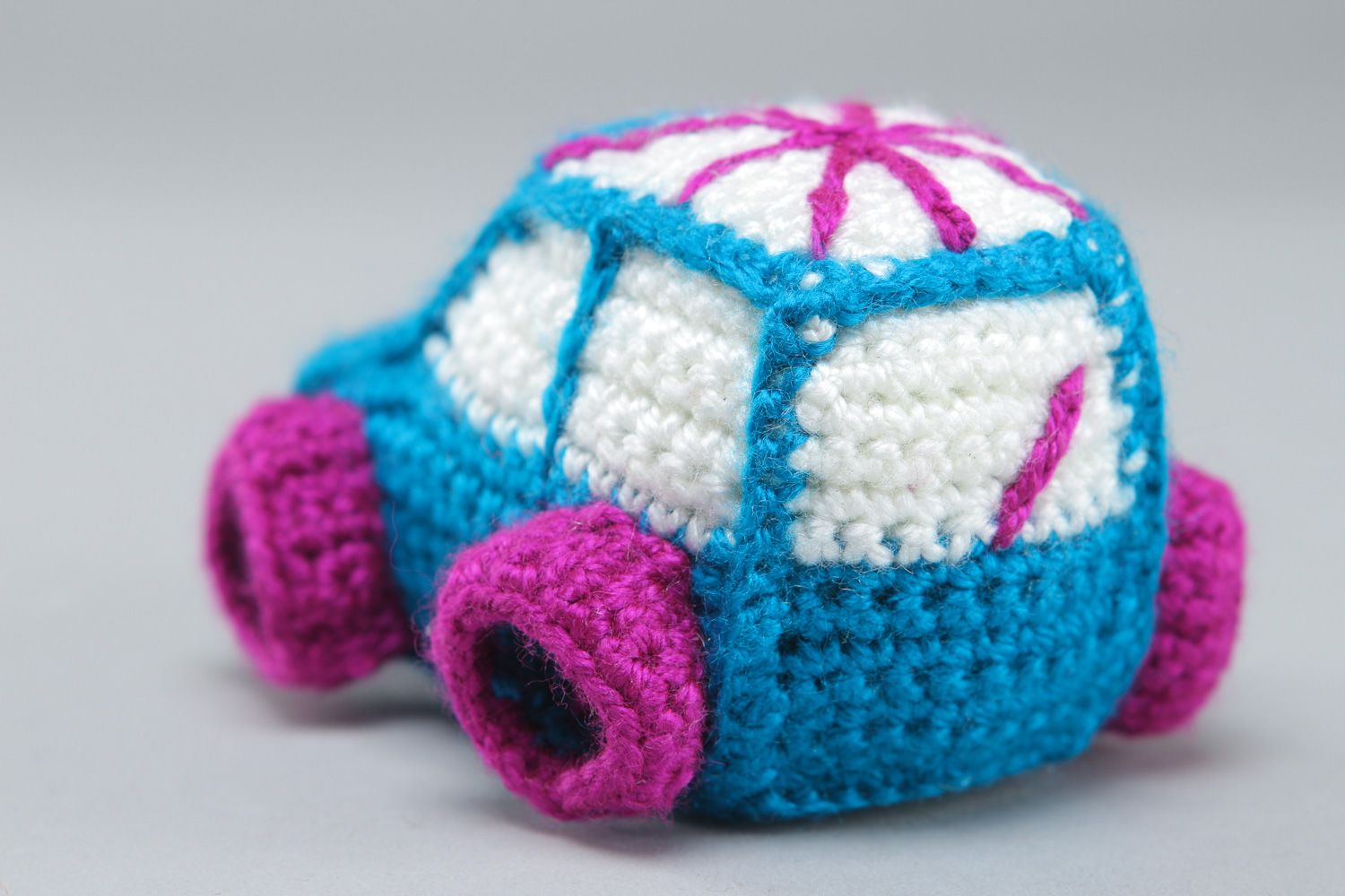 Handmade soft toy in the shape of small car crocheted of acrylic threads photo 2