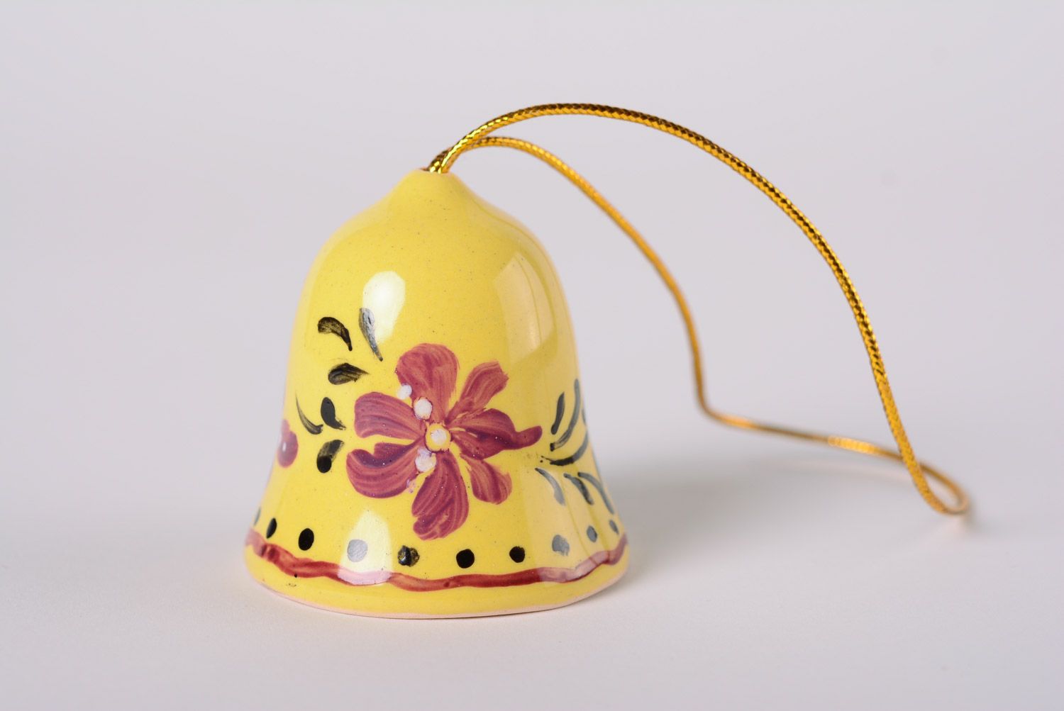 Handmade decorative yellow glaze maiolica ceramic bell with floral painting photo 1