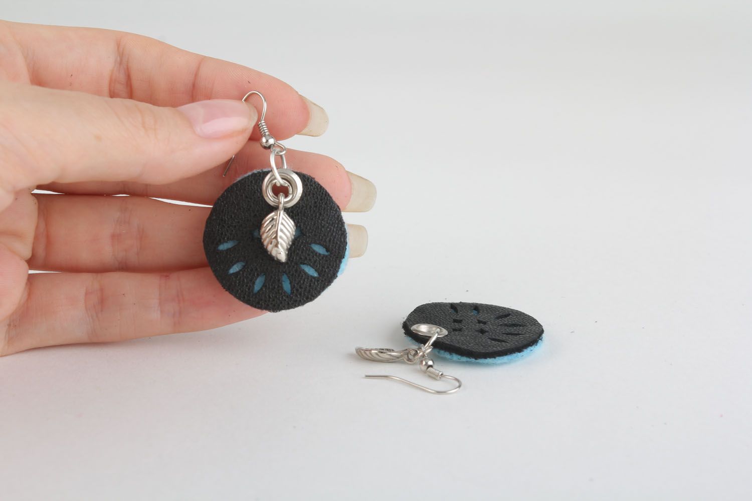 Round earrings made of leather and felt photo 4