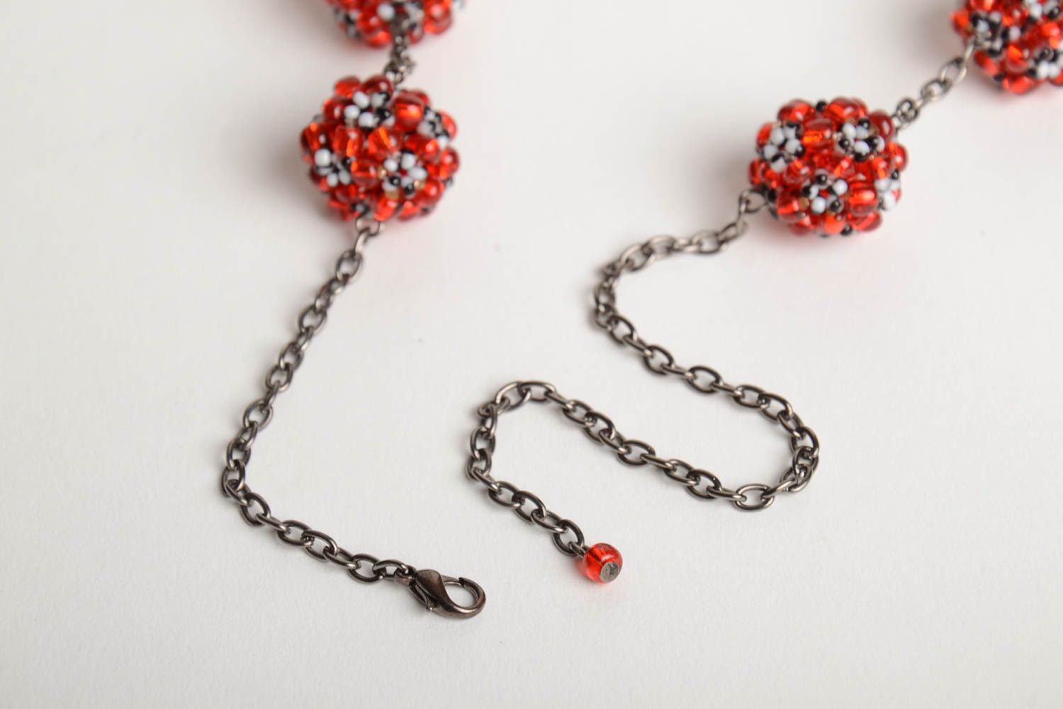 Handmade designer women's necklace on metal chain with red bead woven balls  photo 5