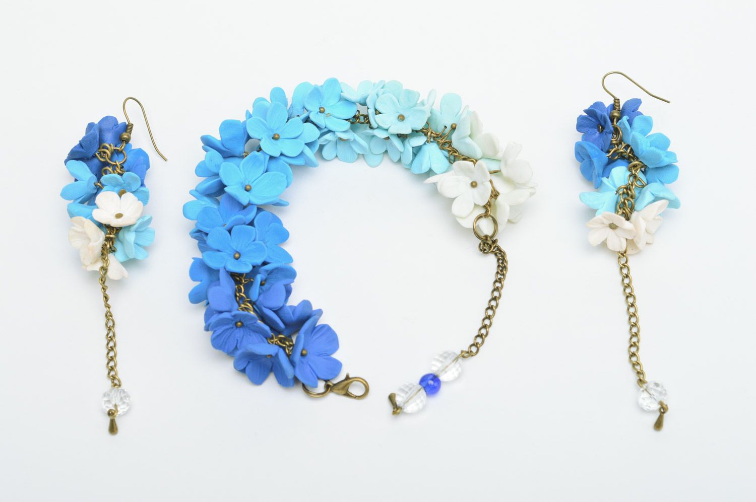 Set of handmade jewelry made of polymer clay bracelet and earrings with blue flowers photo 2