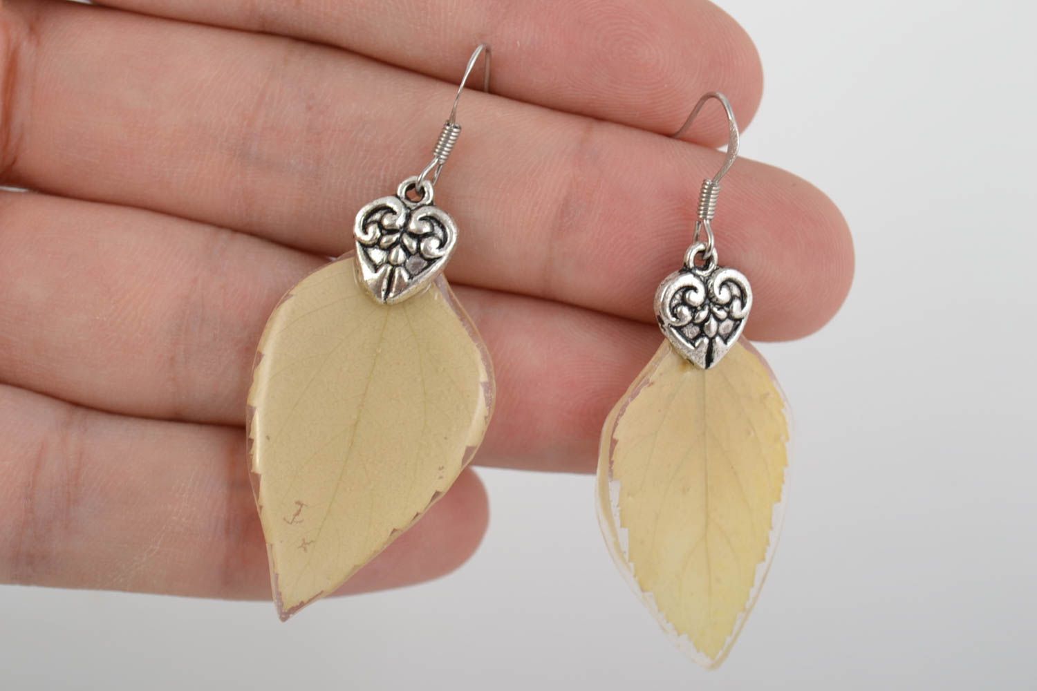 Handmade designer tender earrings with natural leaves in epoxy resin photo 2