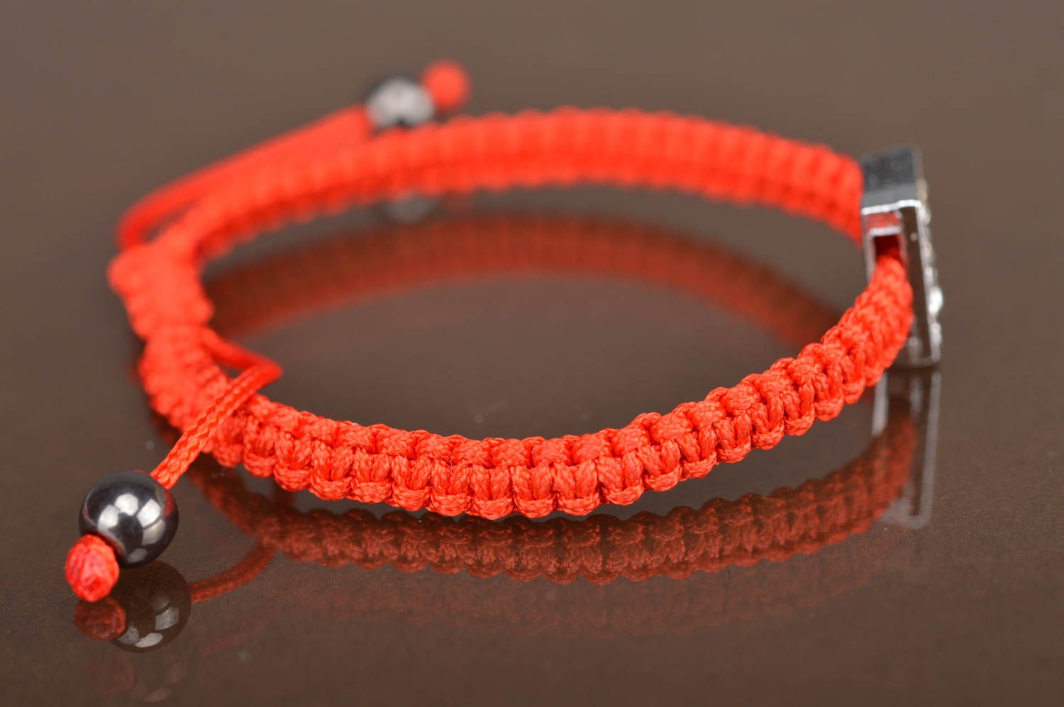 Simple woven handmade beautiful bracelet with letter K made of textile laces photo 5