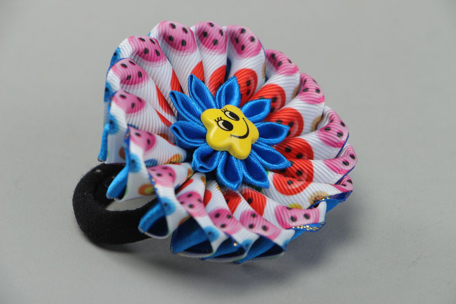 Handmade motley hair tie with volume kanzashi flower made of rep and satin ribbons photo 1