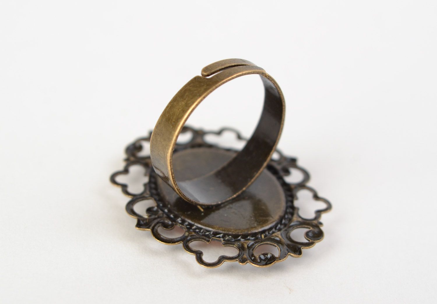 Handmade ring with vintage metal basis and real dried flower in jewelry resin  photo 4
