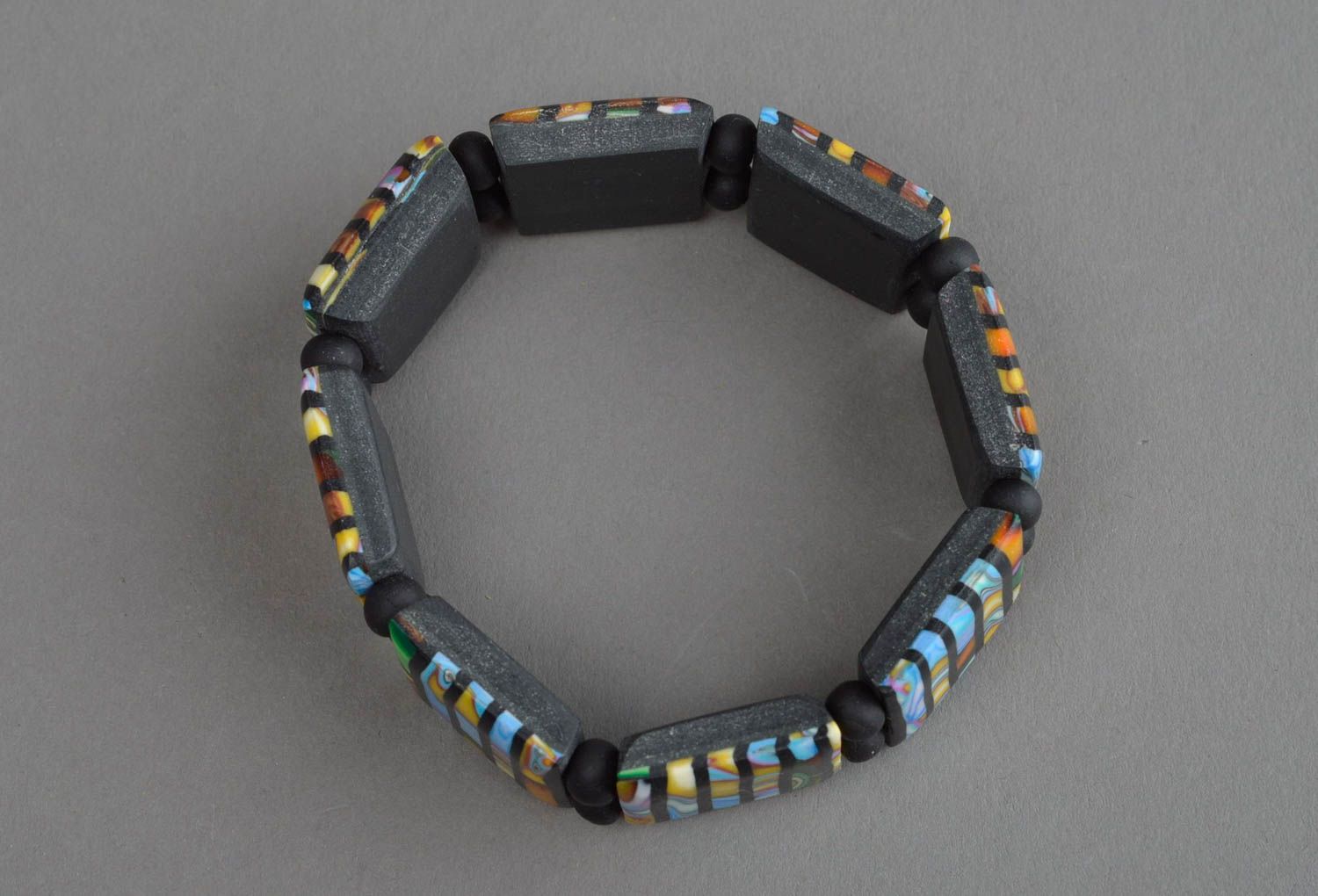 Blue, gold, black colors fashion bracelet on elastic cord photo 2