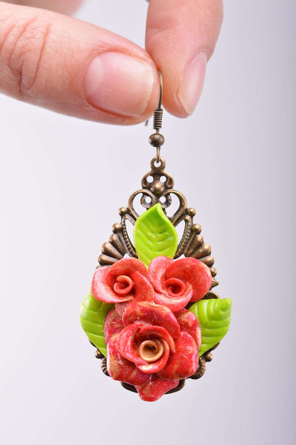 Handmade polymer clay drop earrings with charms in the shape of roses photo 1