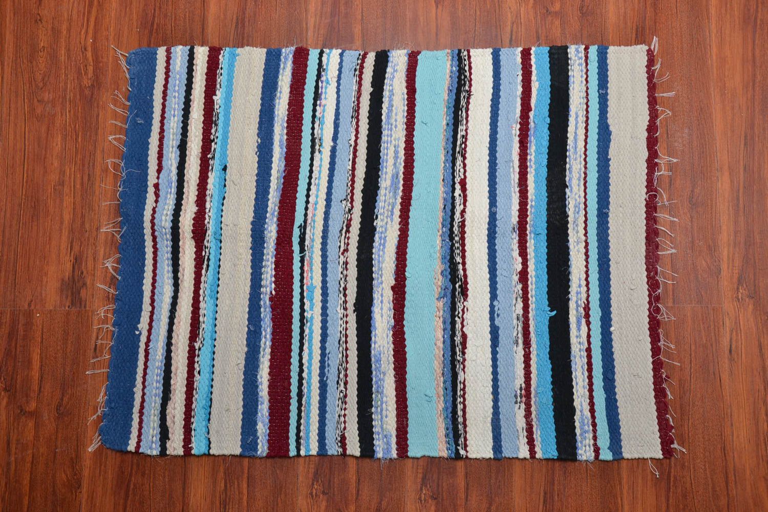 Striped woven rug of blue color photo 1