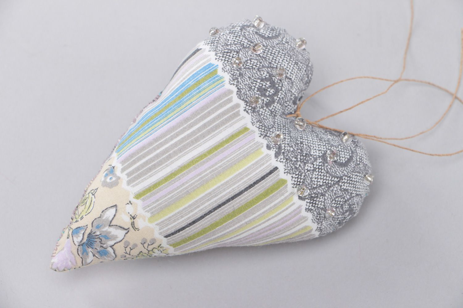 Handmade cotton fabric soft heart with eyelet interior pendant photo 1