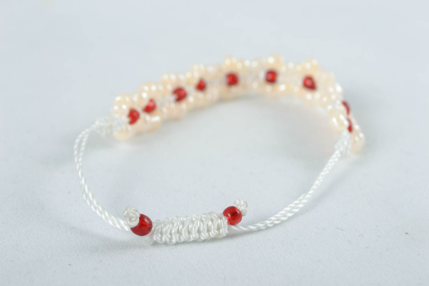 Tender white and red beads strand bracelet fon white cord for girl photo 2