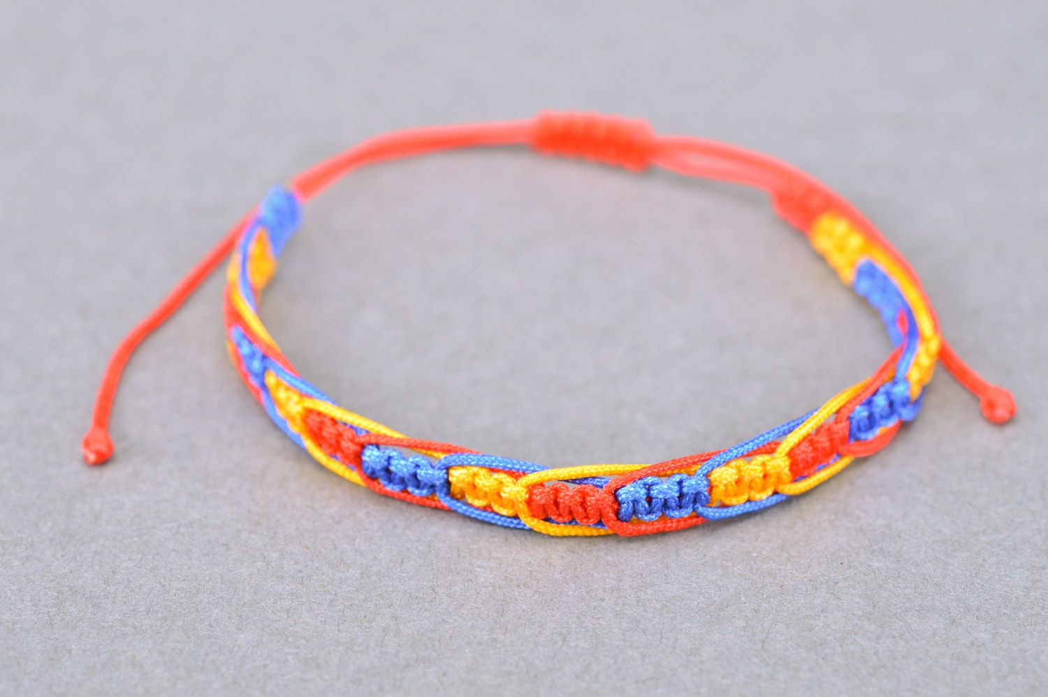 Handmade multi-colored textile bracelet woven of threads for women photo 2
