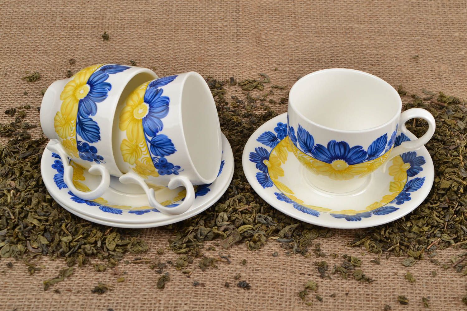 Set of 3 three porcelain white, blue, and yellow colors drinking cups with saucers photo 1