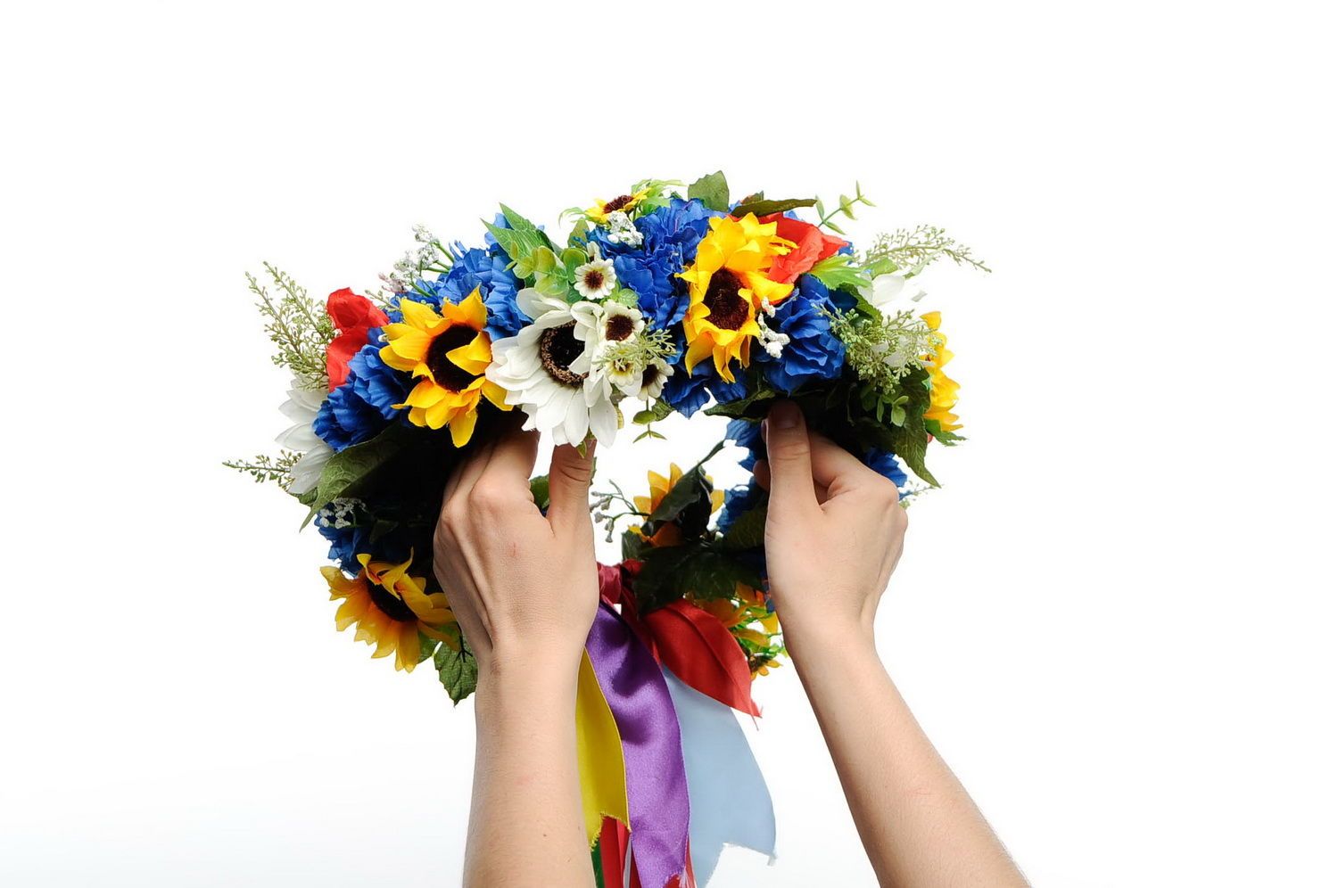 Wreath with artificial flowers and ribbons photo 3