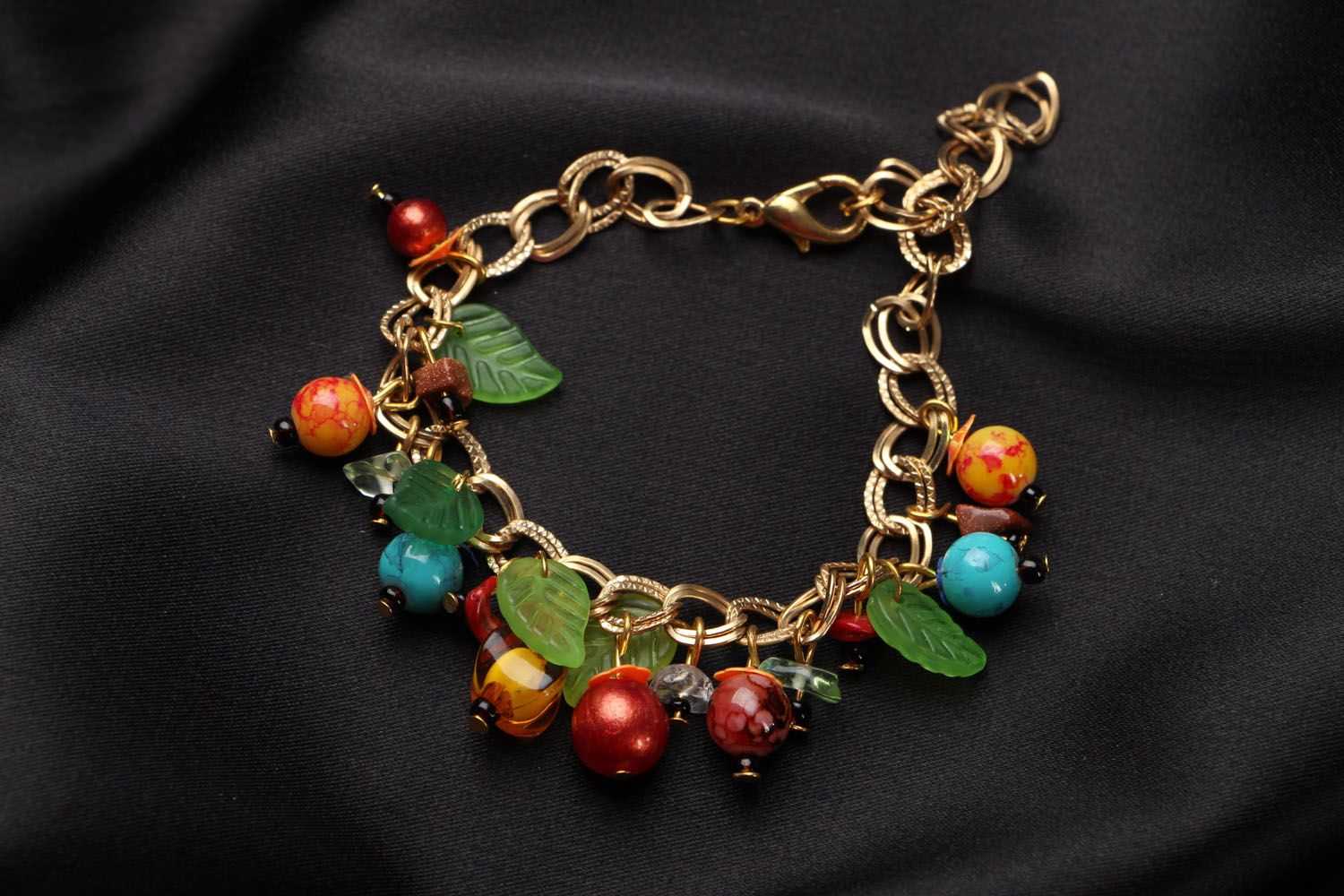 Handmade bracelet with charms photo 1