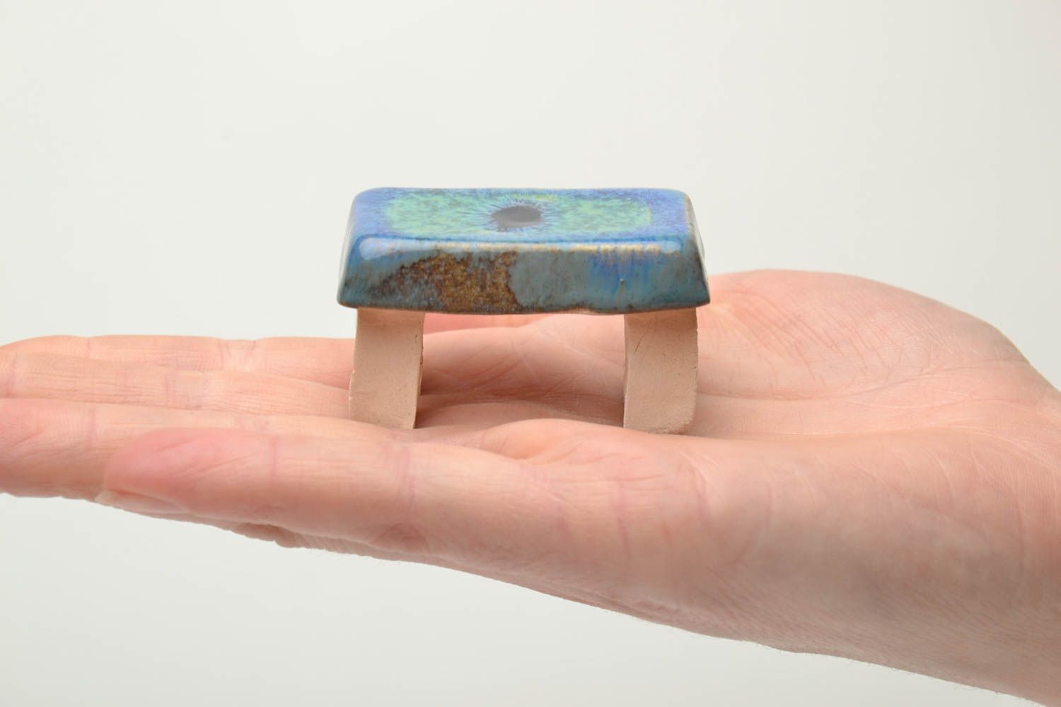 Tiny clay statuette of stool photo 5