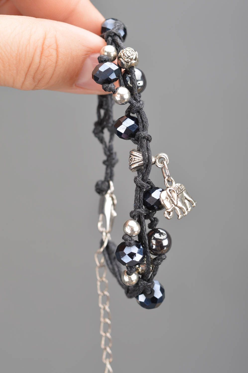 Bracelet en perles de cristal et lacet ciré tressé fin noir éléphant fait main photo 3