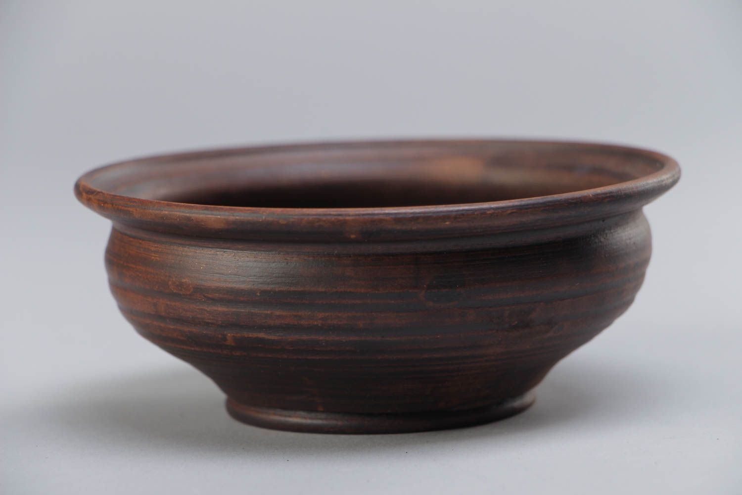 Small dark brown ceramic bowl kilned with the use of milk handmade for 200 ml photo 2