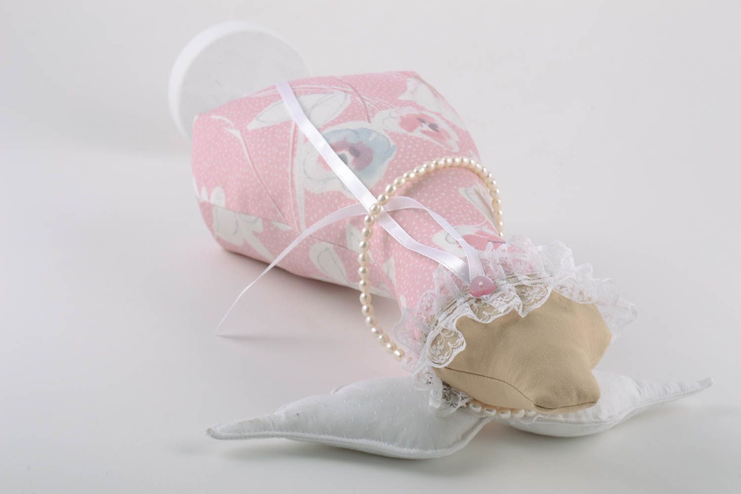 Handmade decorative mini mannequin needle pillow with wings made of natural fabrics photo 4
