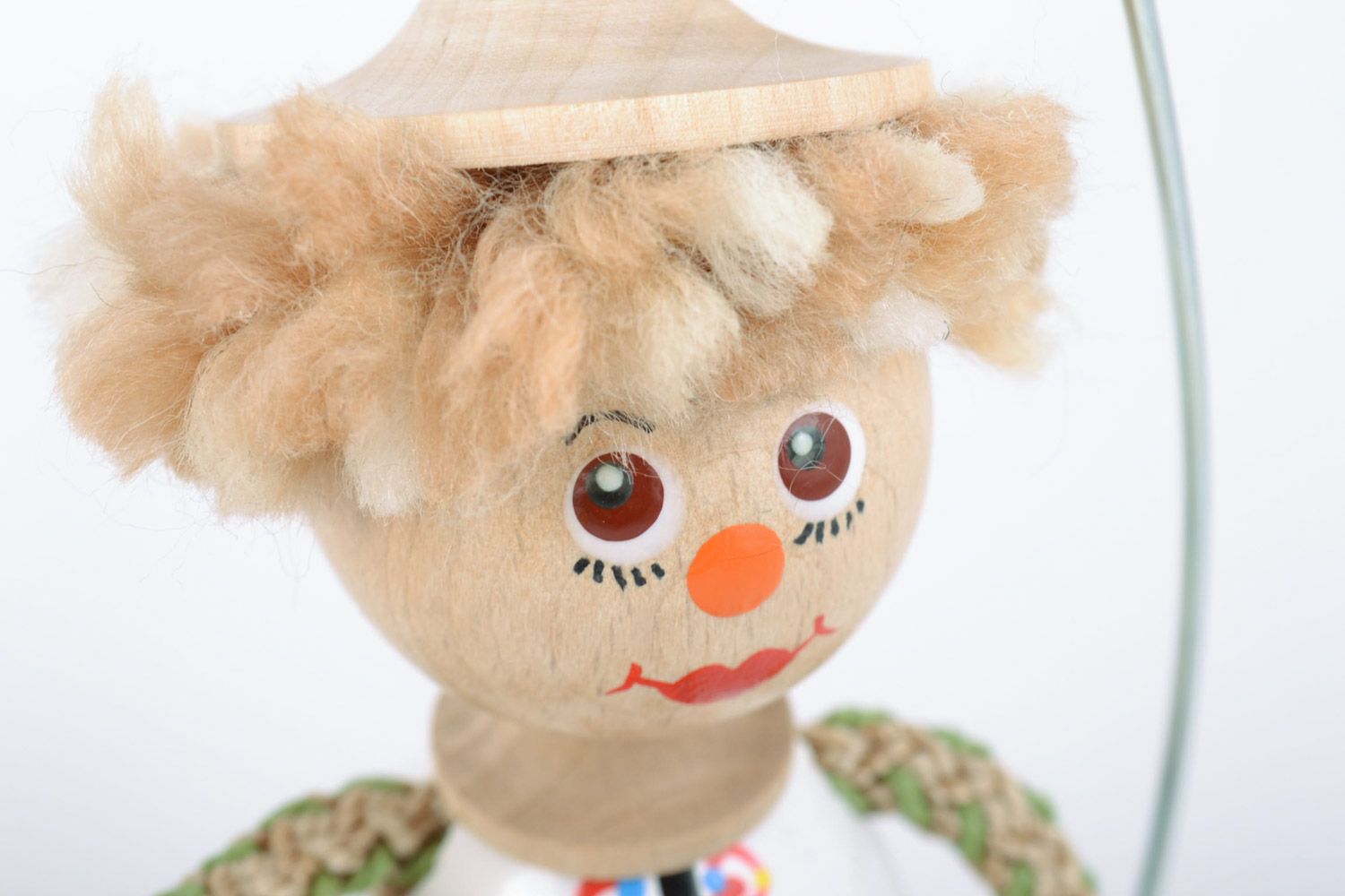 Деревянная игрушка мальчик на качелях с росписью ручной работы авторская фото 3