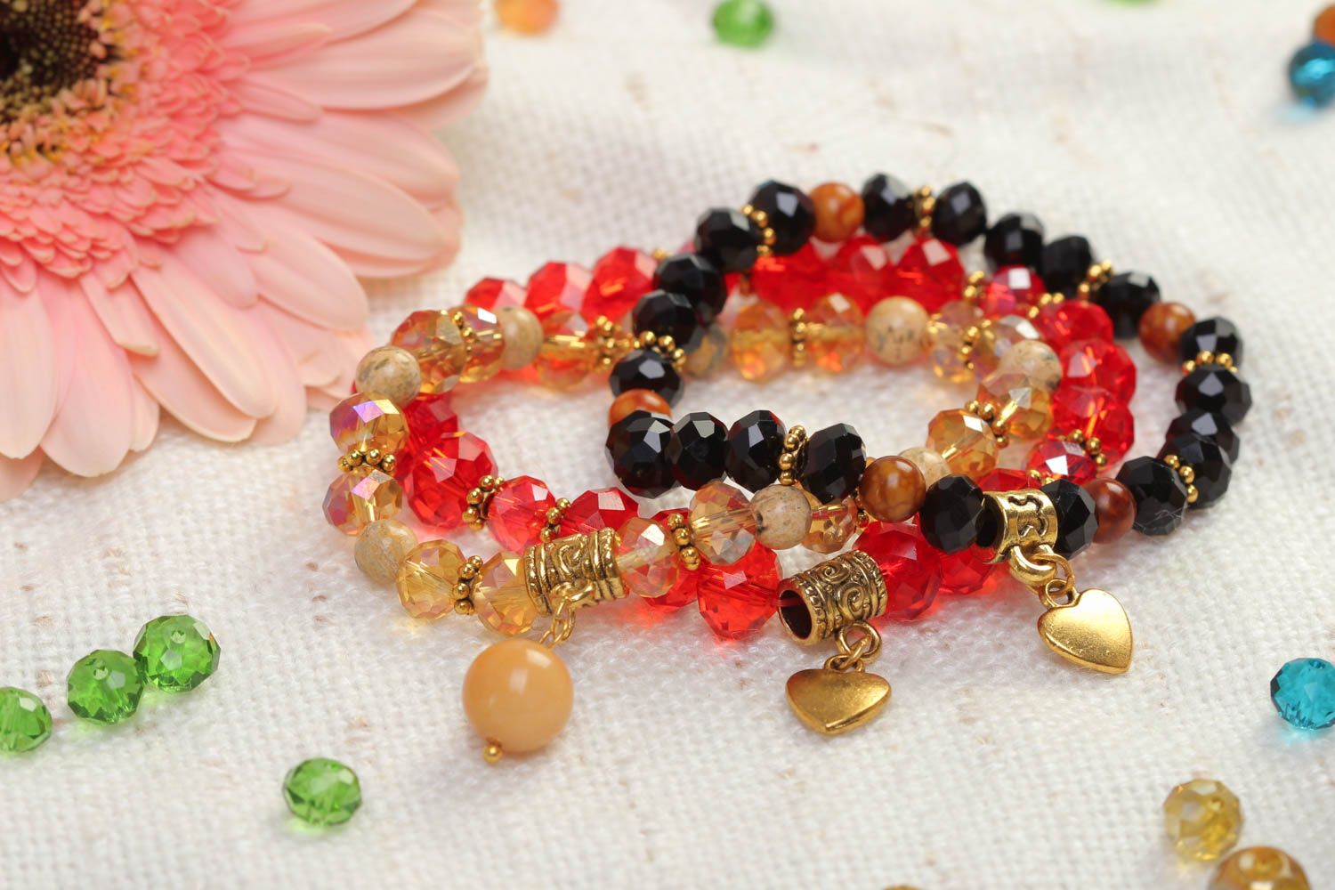 Set of three crystal beads bracelet with heat centerpiece charms photo 1