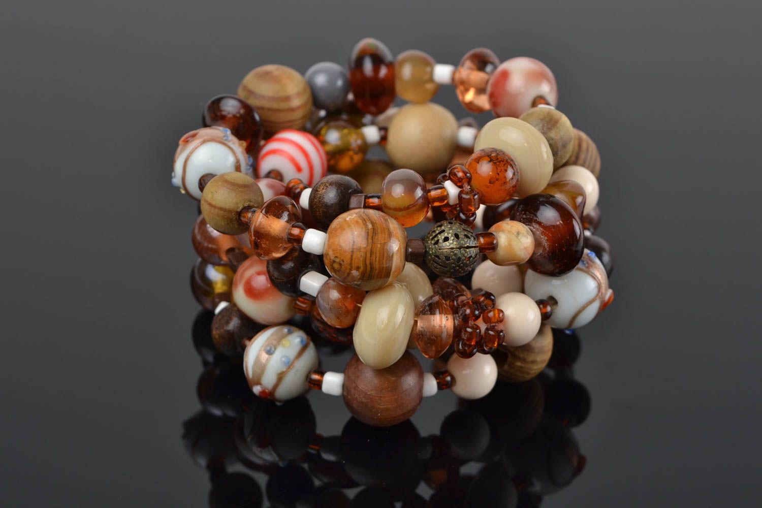 Handmade designer women's wrist bracelet with colorful wooden and glass beads photo 1