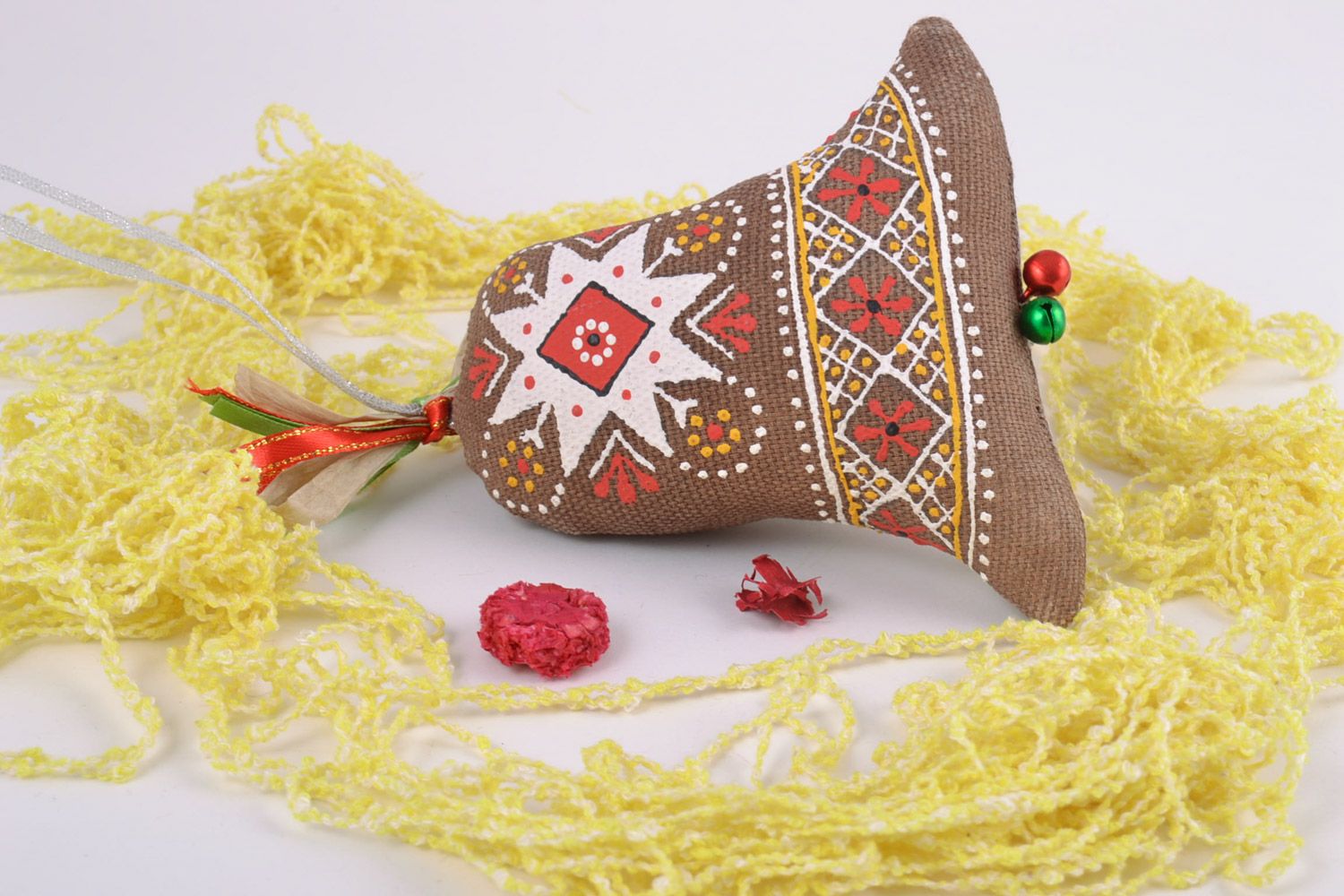 Homemade decorative fragrant soft bell sewn of fabric and painted with ornaments photo 1