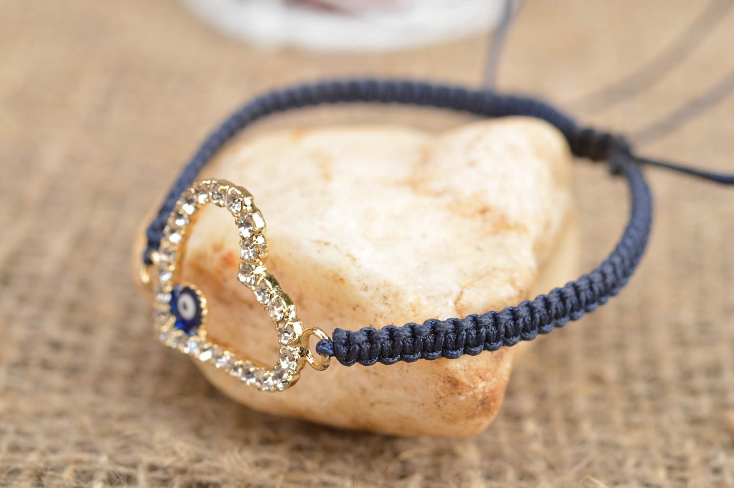Unusual handmade blue woven textile wrist bracelet with heart shaped decoration photo 1