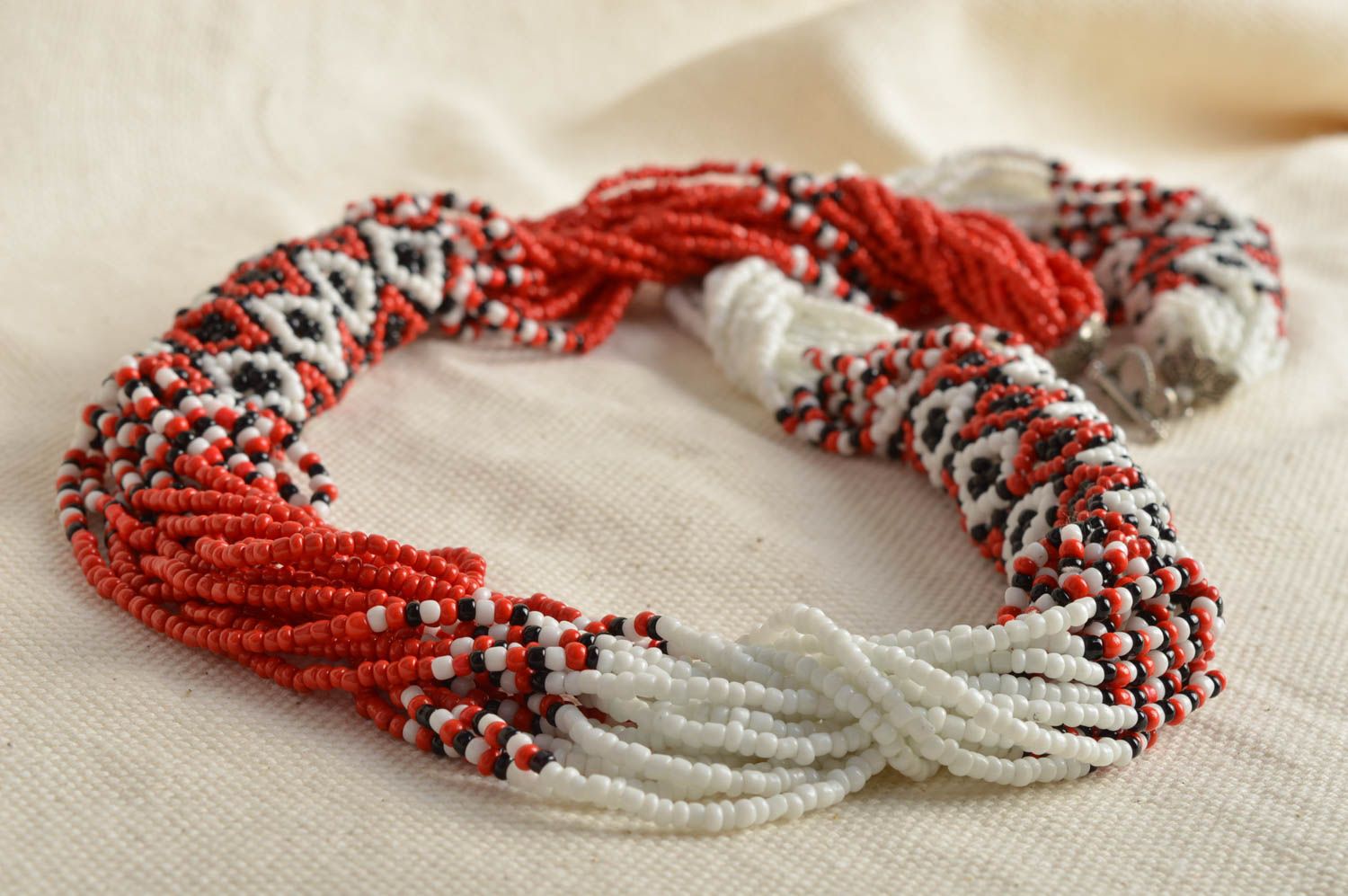 Handmade massive women's red and white beaded cord necklace with ethnic ornament photo 1