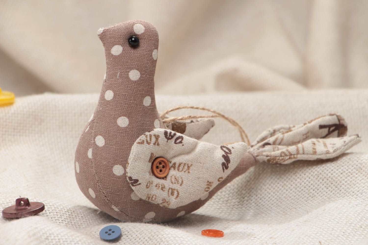 Small handmade decorative wall hanging soft toy bird sewn of beige fabric  photo 1