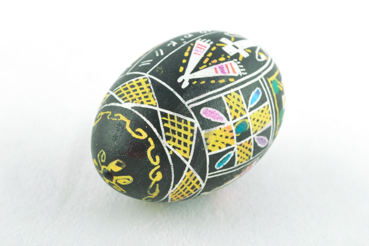 Handmade Easter egg with art painting on black background for interior decoration photo 3