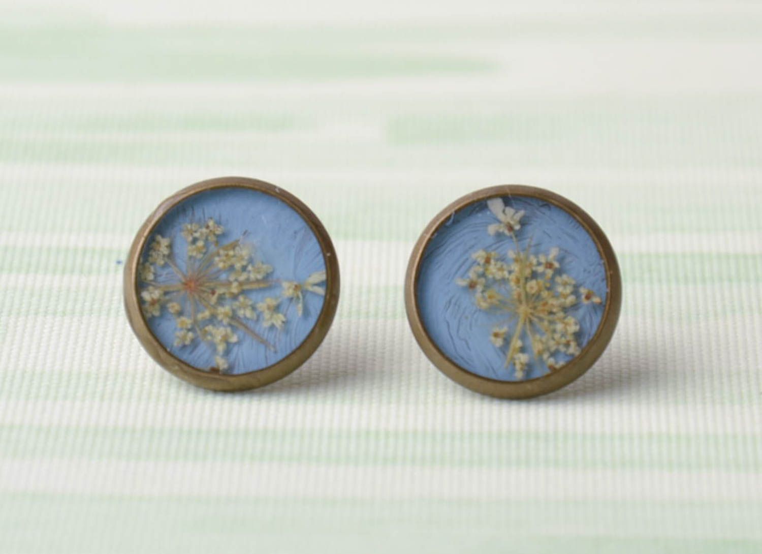 Blue earrings with natural flowers in epoxy resin photo 1