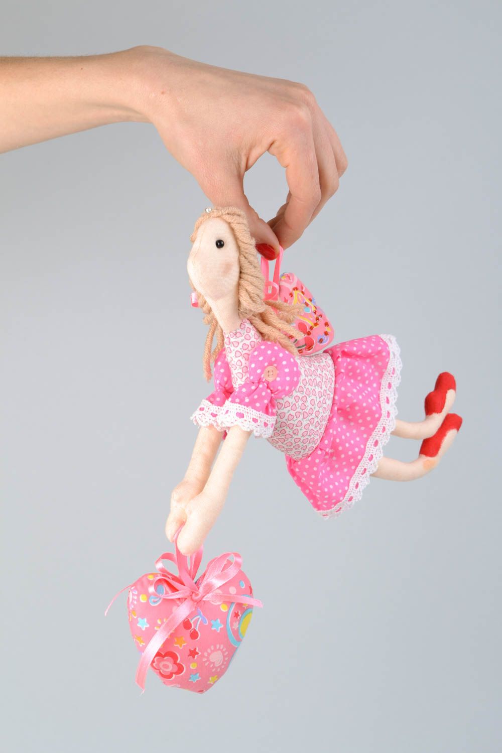 Textile toy angel with heart photo 1