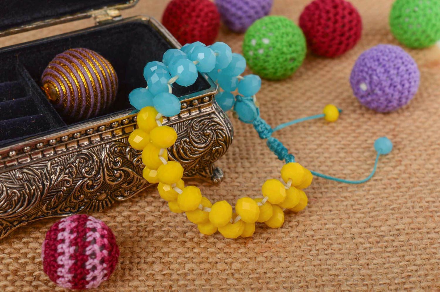 Handmade beautiful blue and yellow bracelet made of crystal macrame technique photo 1
