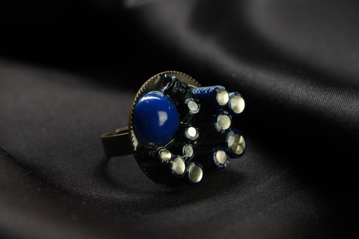 Blue metal ring in cyberpunk style photo 1