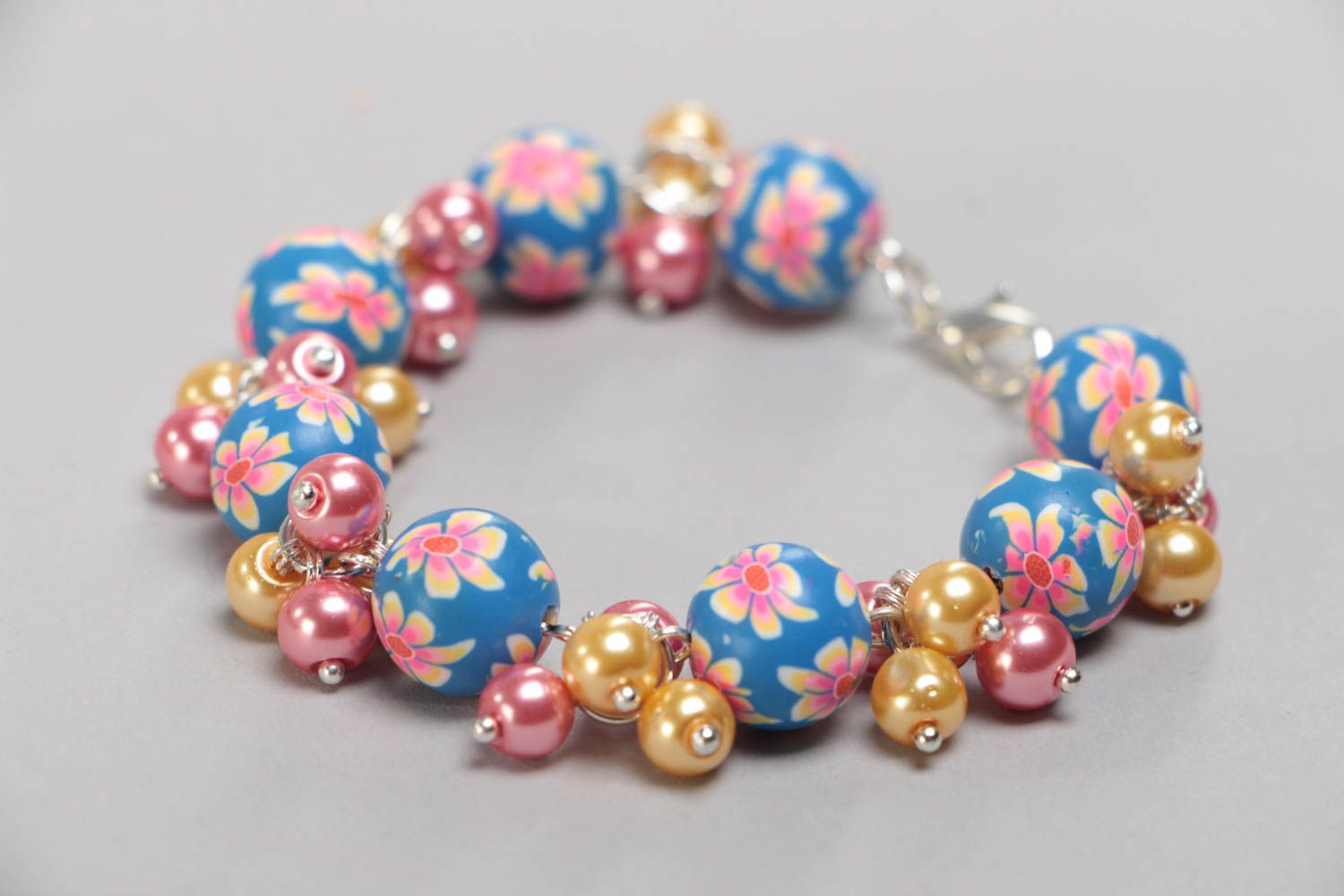 Colorful handmade children's plastic bead bracelet with ceramic pearls  photo 2