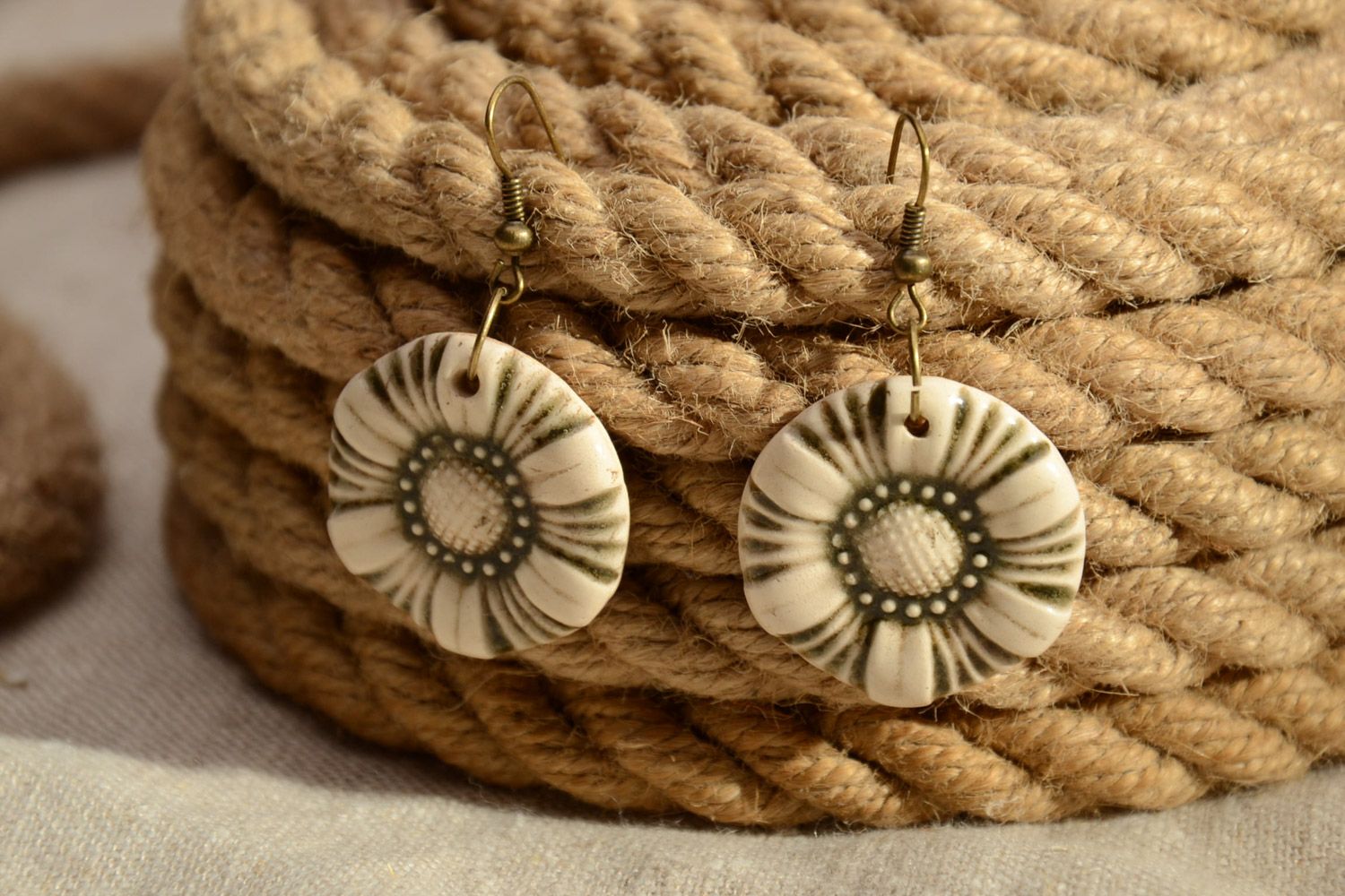 Handmade round beige dangle earrings molded of white clay and painted with enamel photo 1