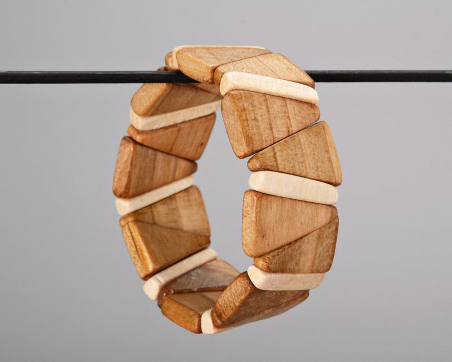 Wooden bracelet on elastic band made from triangular pieces photo 3