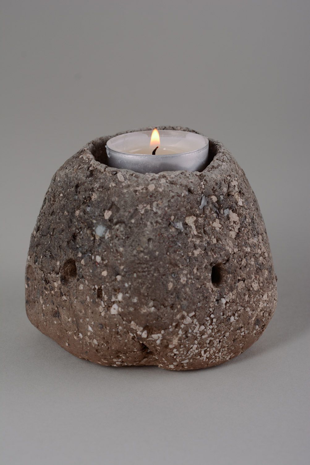 Unusual small handmade clay candle holder in the shape of stone photo 1
