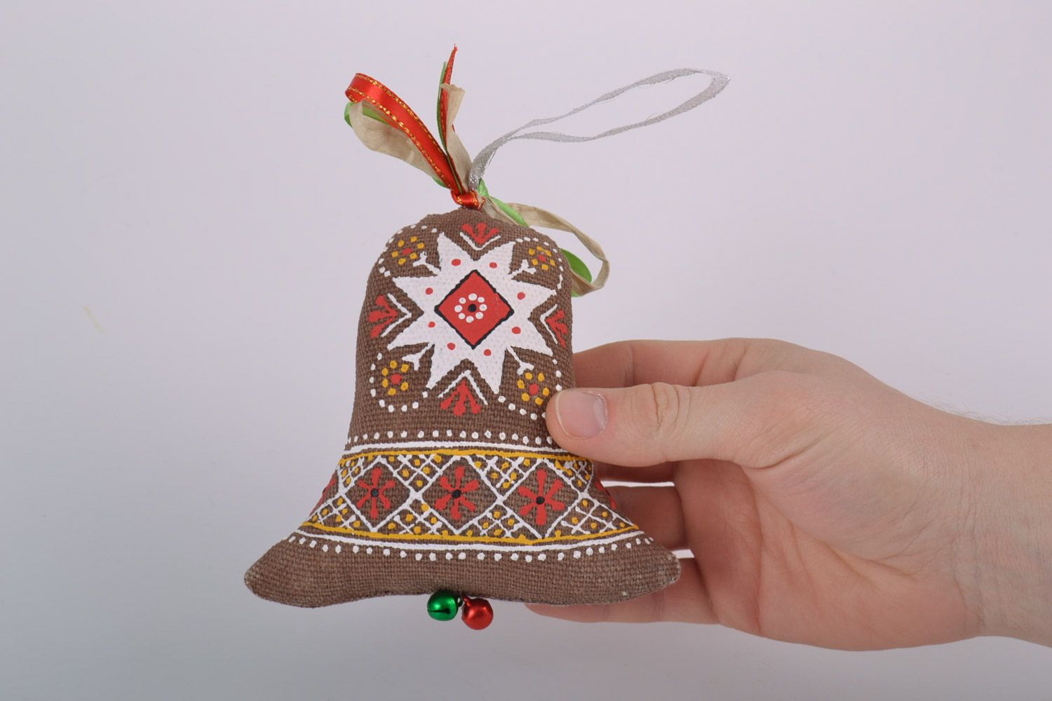 Homemade decorative fragrant soft bell sewn of fabric and painted with ornaments photo 5