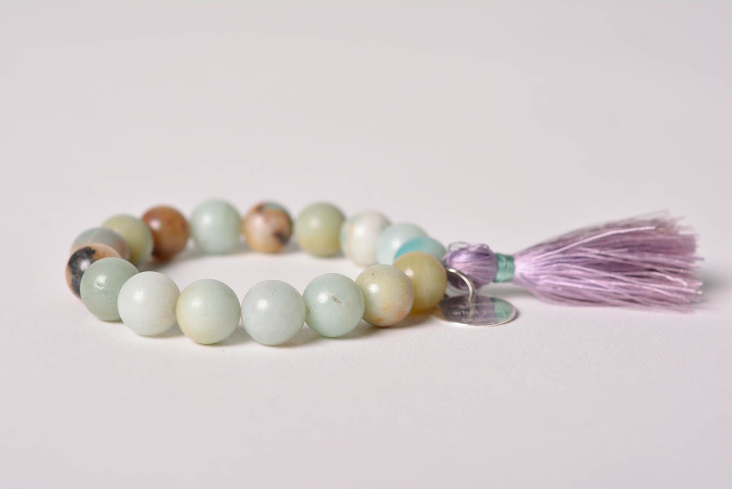 Handmade wrist bracelet with natural amazonite stone beads and thread tassels photo 4