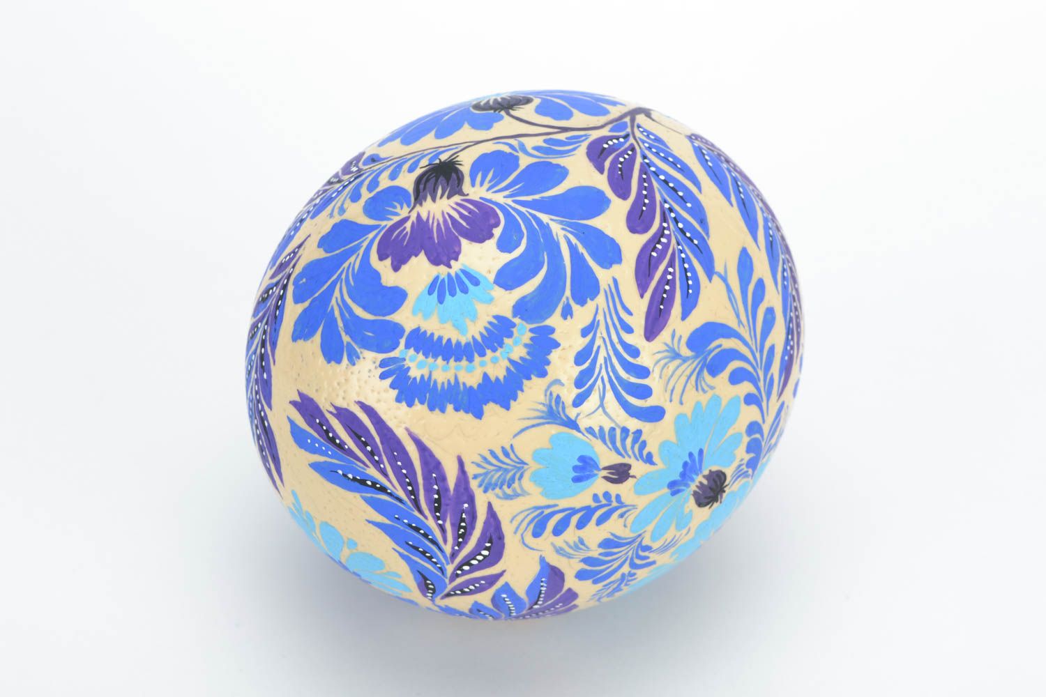 Huevo de Pascua de avestruz artesanal con pintura de Petrykivka azul bonito foto 3
