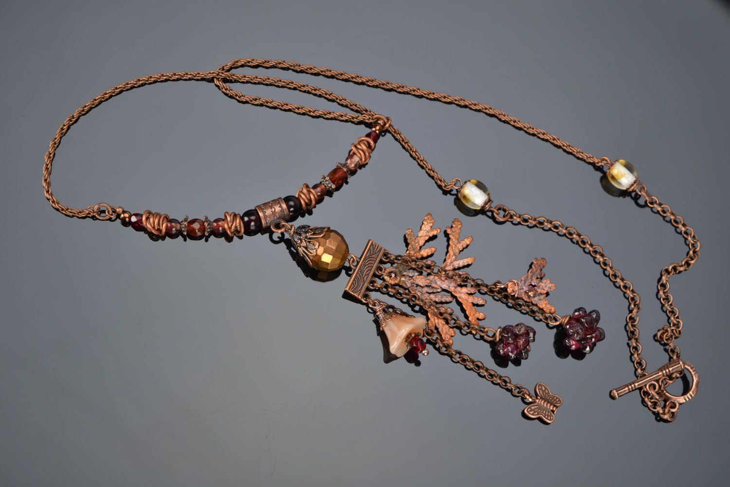 Pendant with coppered thuya branch photo 1