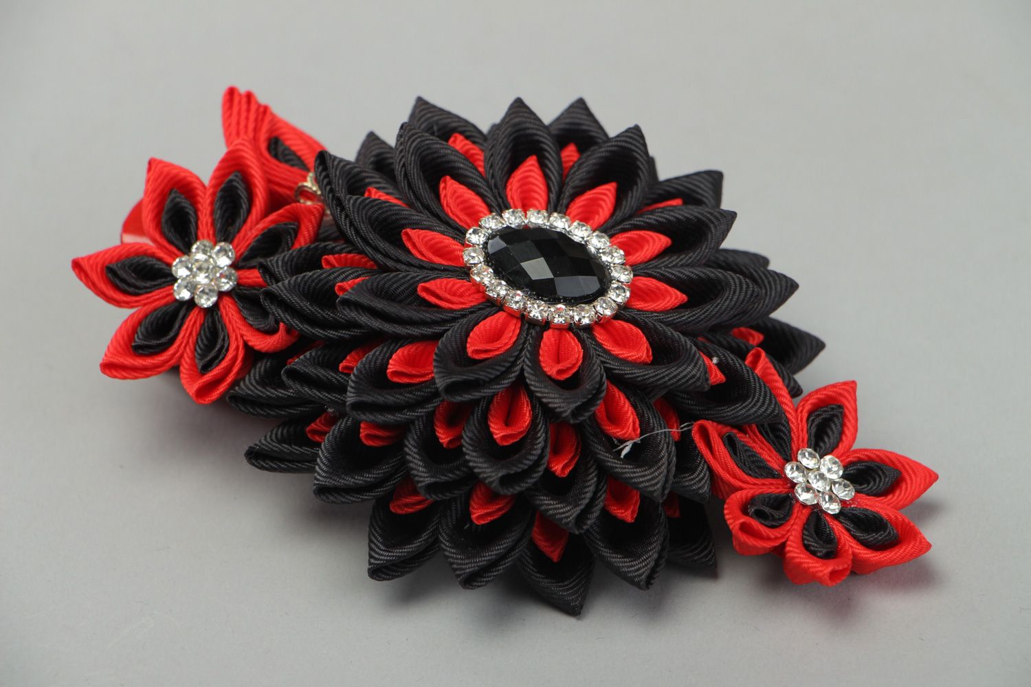 Black and red handmade hair clip with kanzashi flower created of rep ribbons photo 1