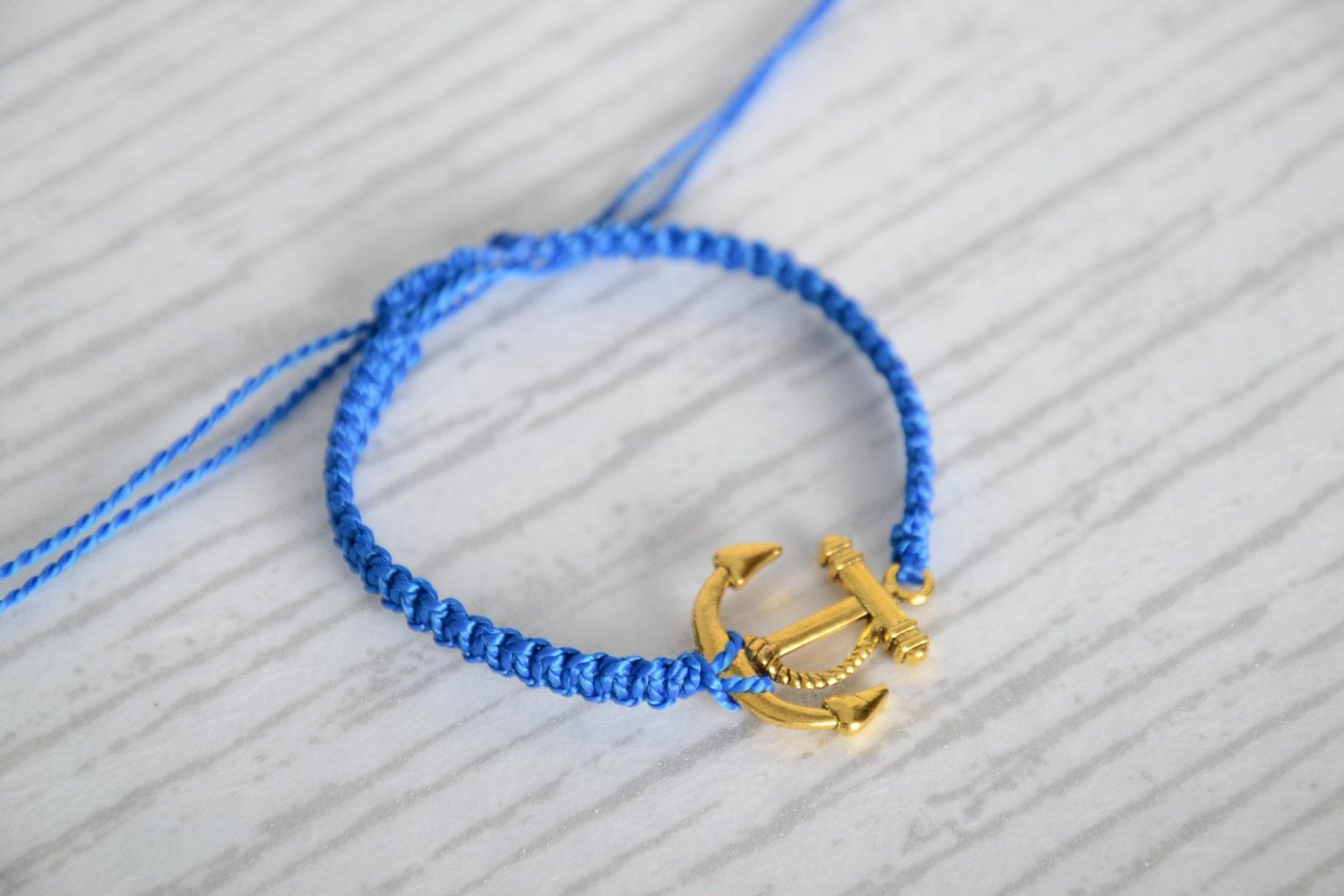 Handmade blue macrame woven cord bracelet with anchor charm photo 1