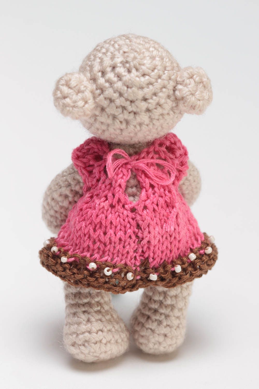 Handmade small soft crocheted toy beige bear girl in pink dress for children photo 4