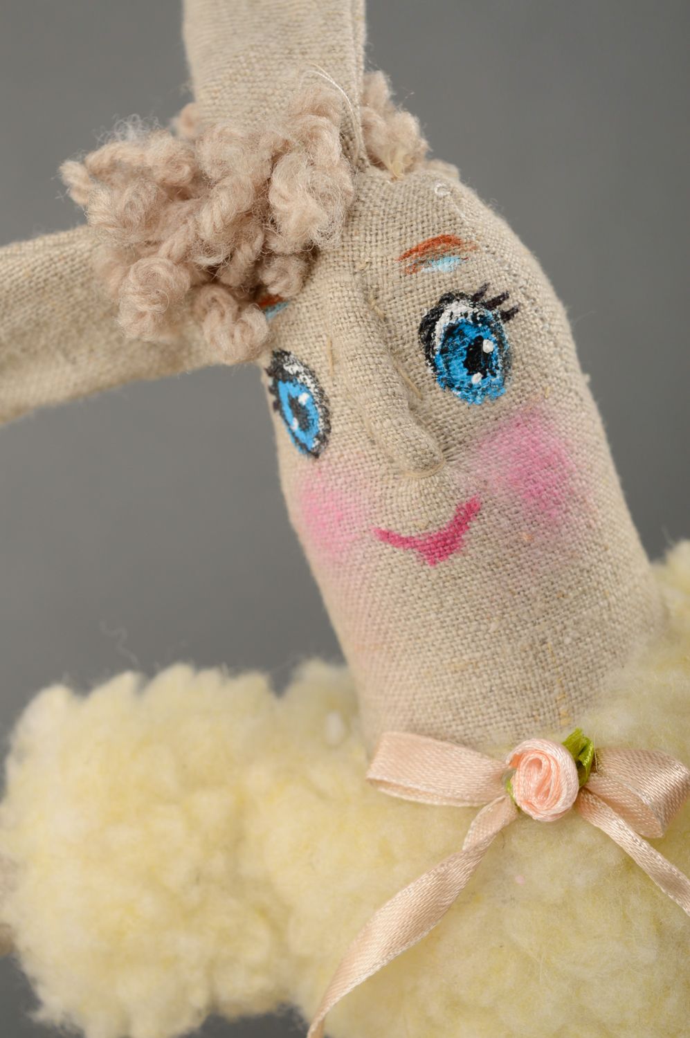 Fabric toy rabbit in woolen cardigan photo 1