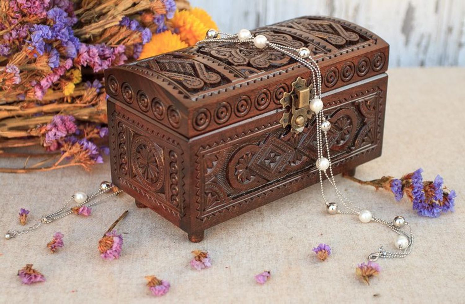 Carved wooden box with a lock photo 1